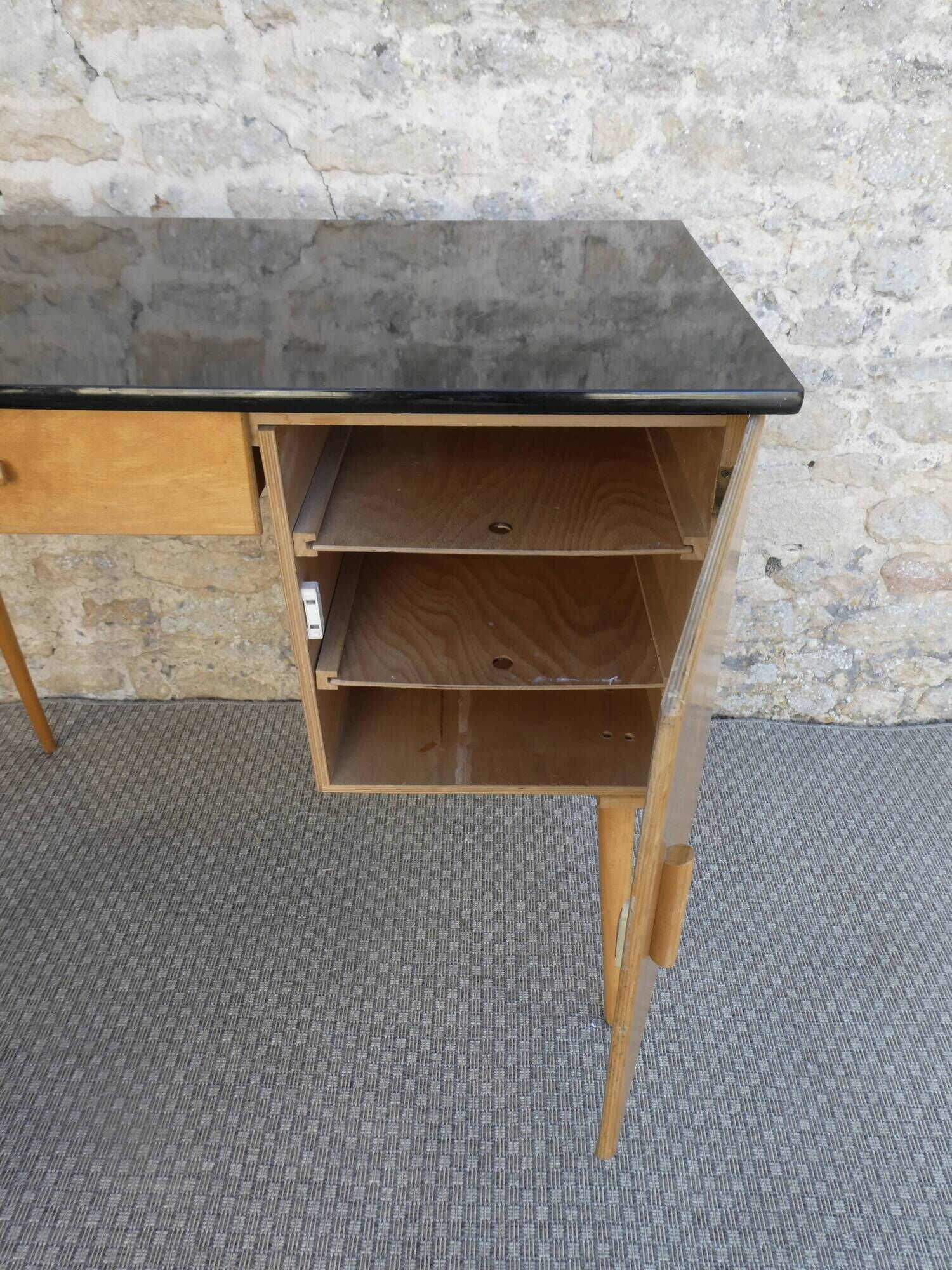 Baumann desk in light wood and black Formica, around 1960.