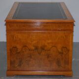 Partner desk in burr walnut designed to conceal computer equipment.