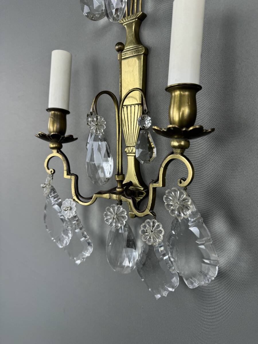 Pair of brass and crystal wall lights, 20th Century