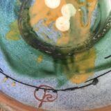 Two cups and their hand-painted ceramic saucer