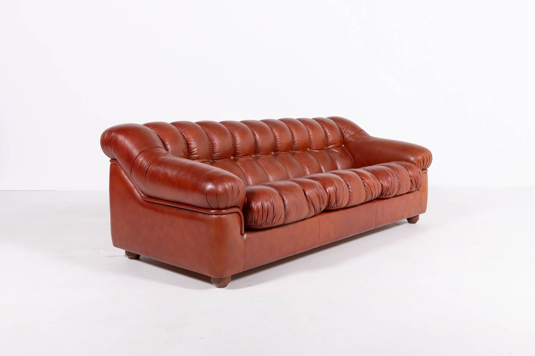 Sculptural Italian Modern three seat leather sofa, 1970’s