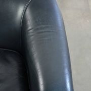 Set of dark blue cow leather club armchairs with a unique design