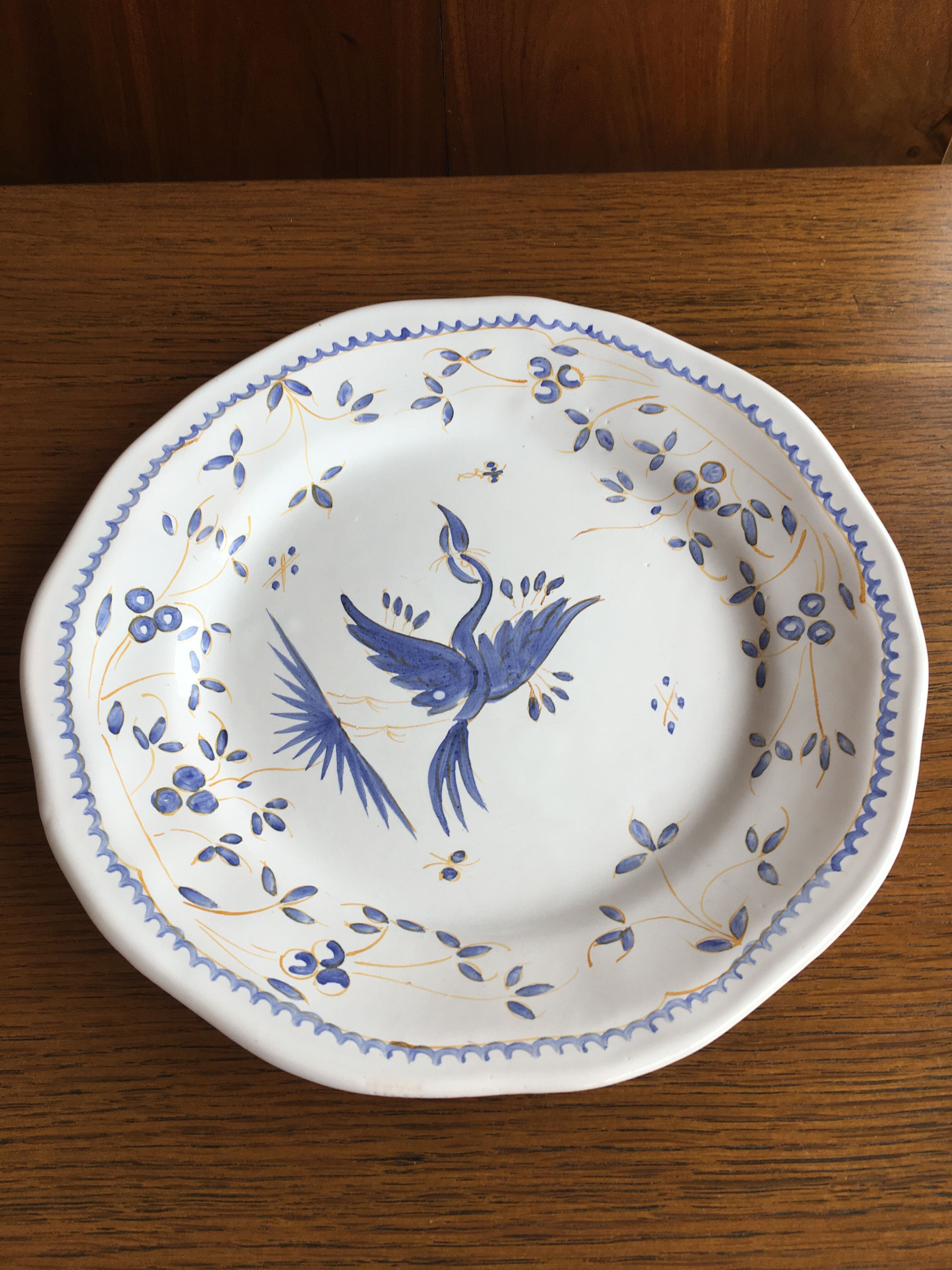 Moustiers plate signed bird decor