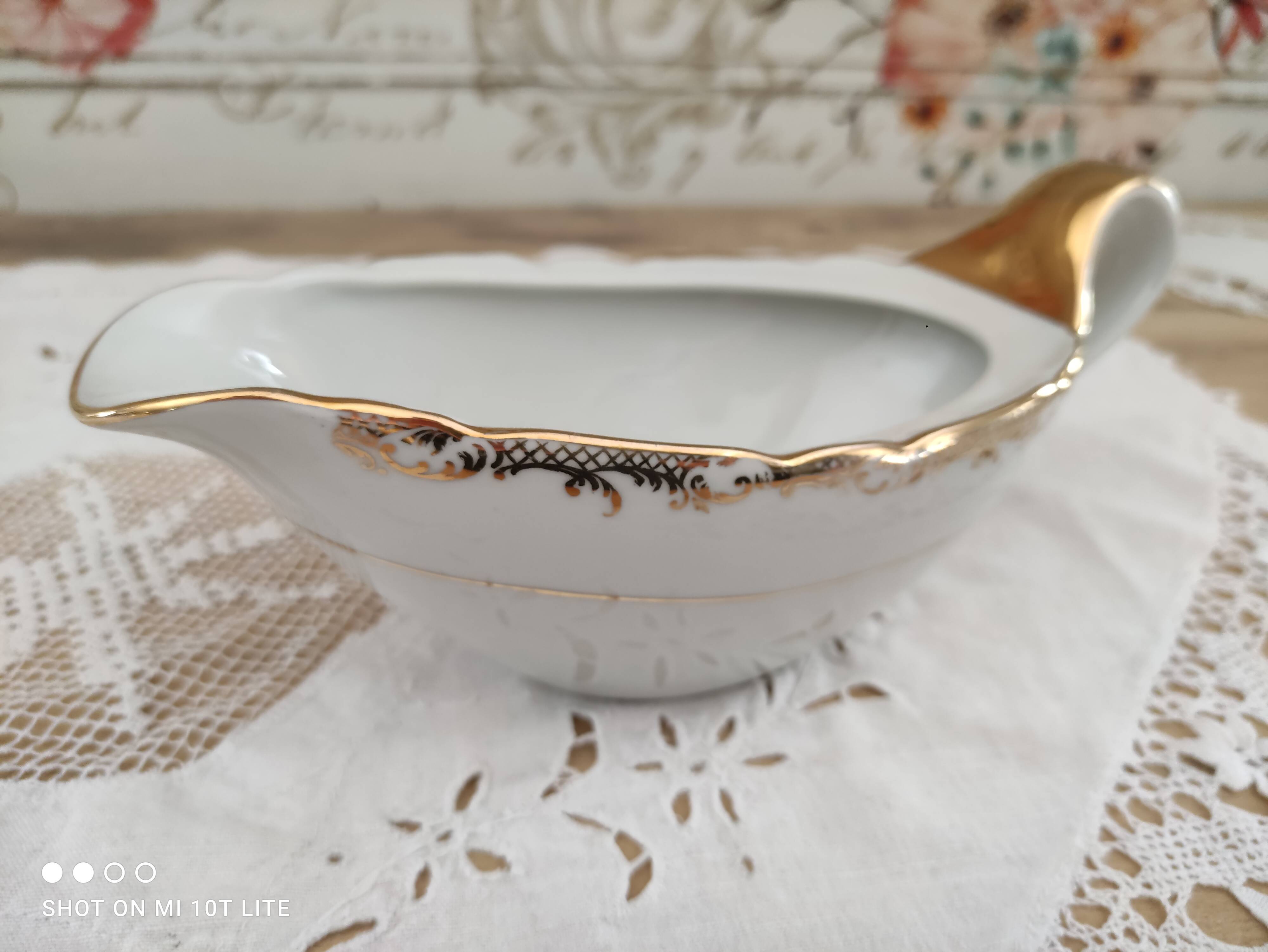 White porcelain saucière evor france frieze golden crosses