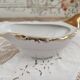 White porcelain saucière evor france frieze golden crosses