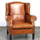 Très beau fauteuil à oreilles en cuir de mouton avec des détails époustouflants