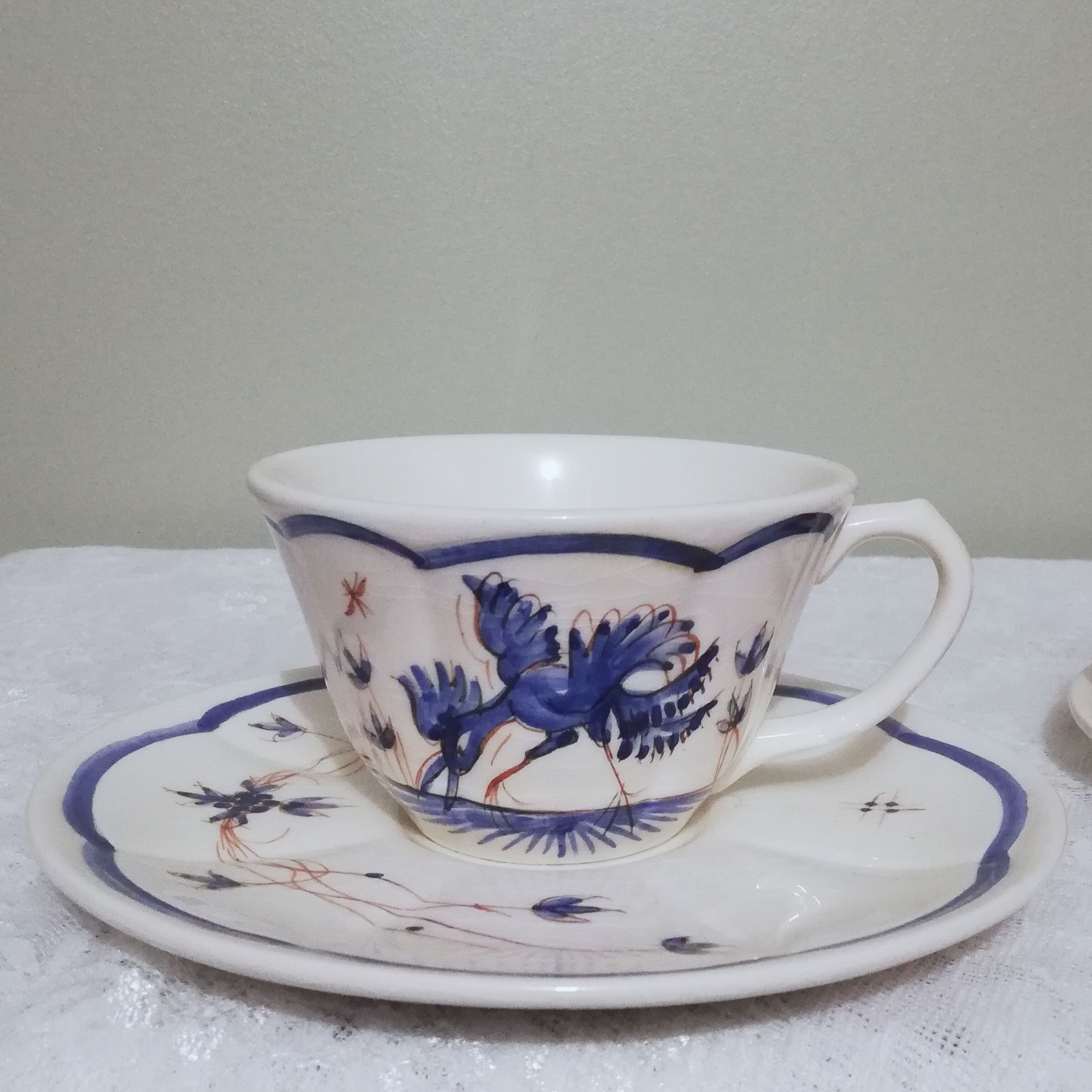 Two ceramic cups by Grignan signed Peguet