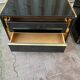 Two lacquered bedside tables.