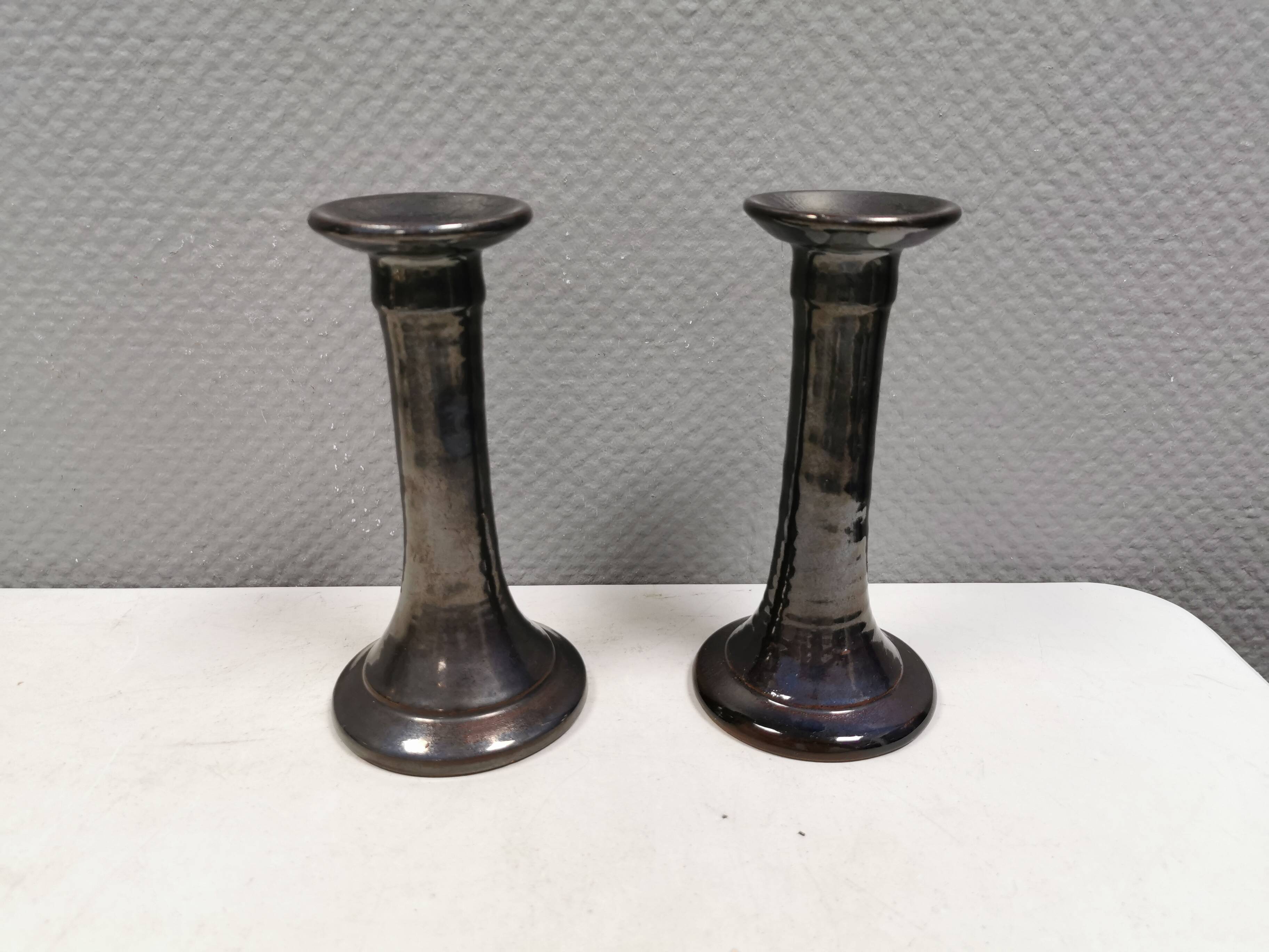 A set of ceramic candlesticks in bluish metallic glaze, Denmark 1980s