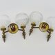 Paire d'appliques murales vintage en laiton et globe en verre années 50