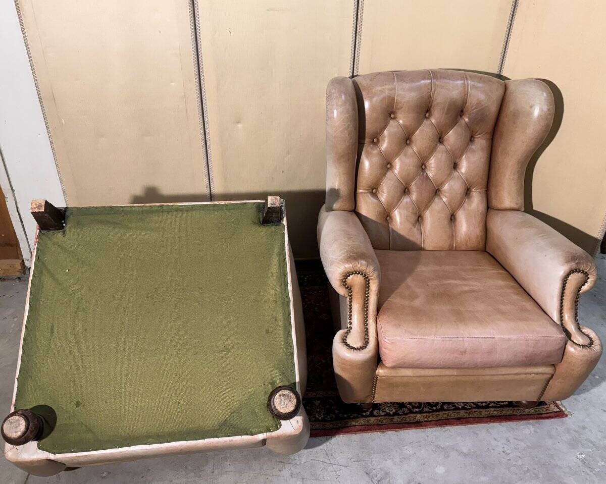 Pair of Chesterfield leather wingback armchairs