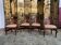 Suite de 4 chaises gondoles en acajou Empire
