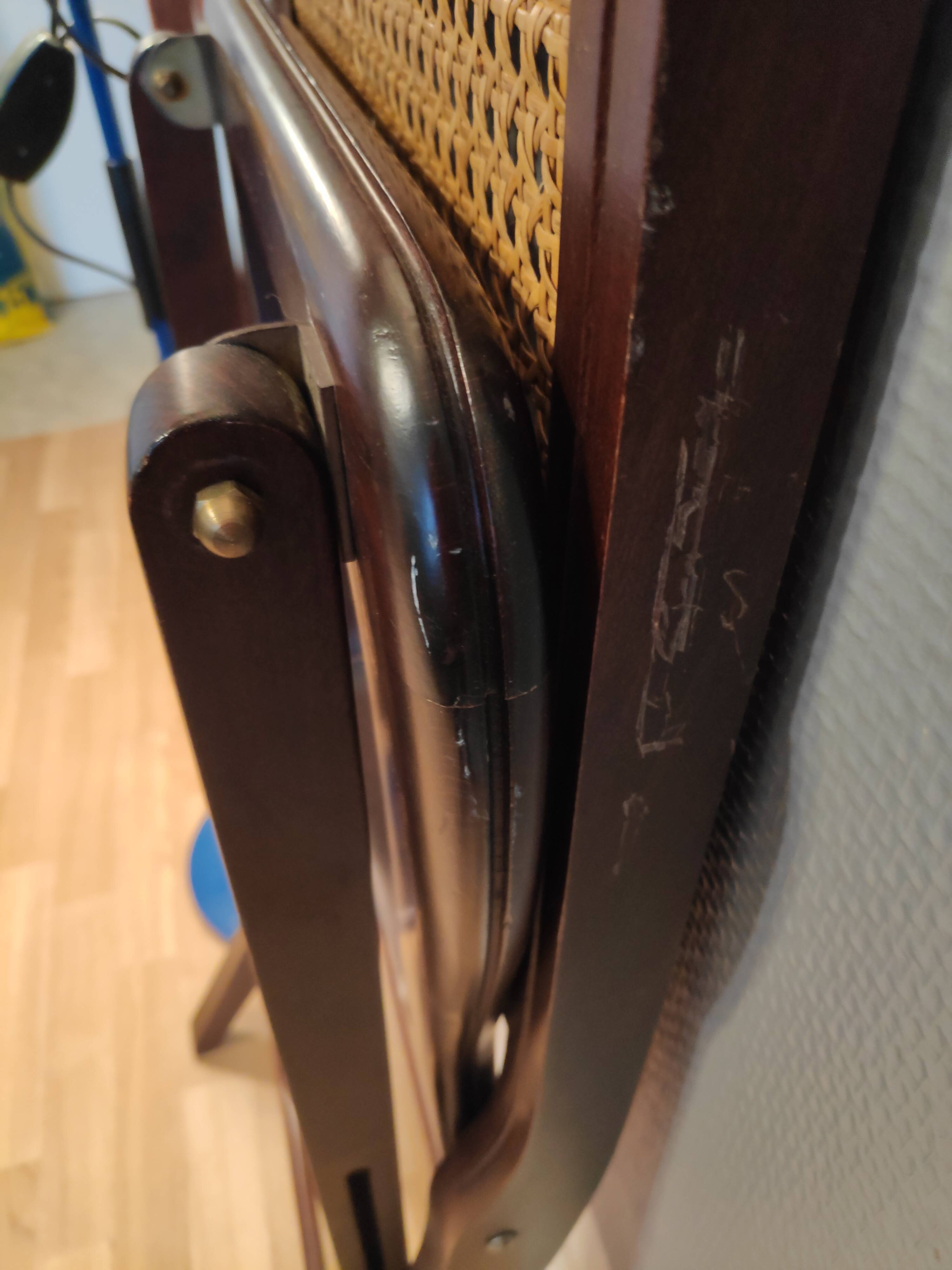 Wooden folding chairs and caning