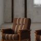 Modern Danish, a pair of lounge chairs in oak and wool, Henning Kjærnulf, 1960s.