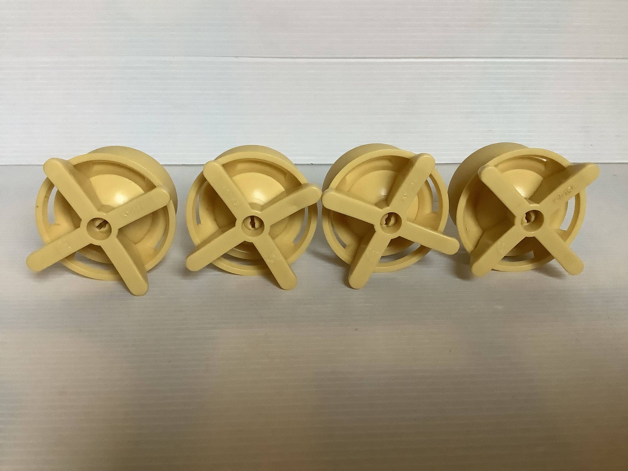 Quatre coquetiers rotatifs