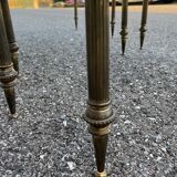 Pull-out table in marble and brass