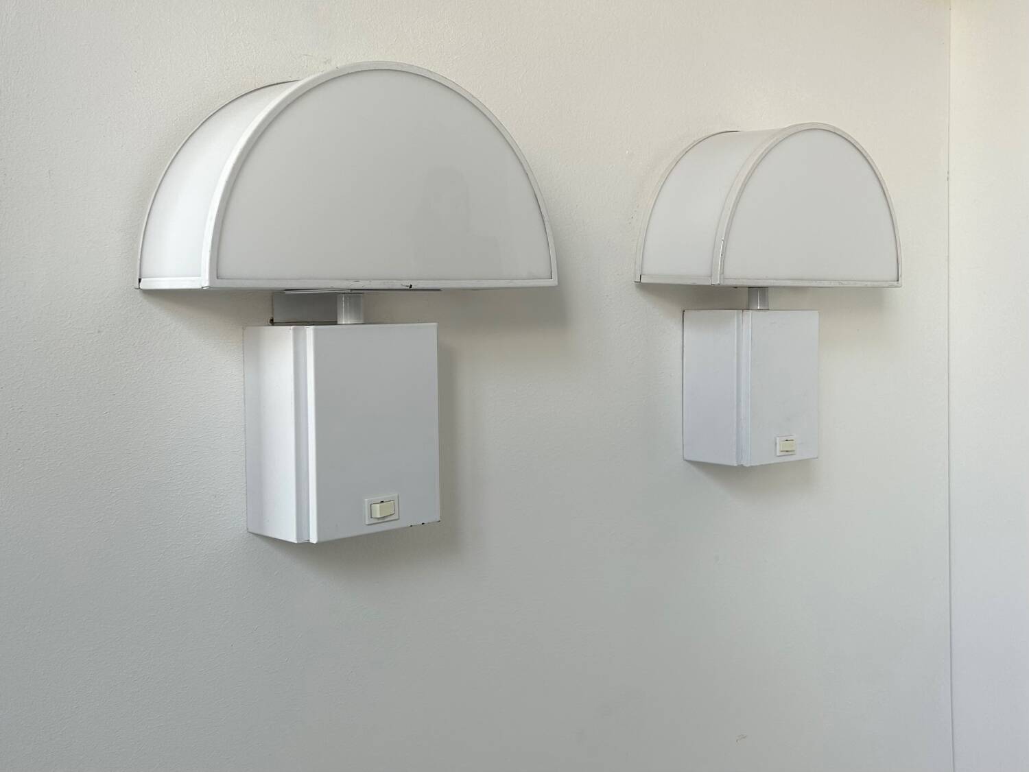Pair of vintage Olympe Guzzini wall lights, metal and Perspex, Italy 1970