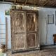 The antique patinated wardrobe