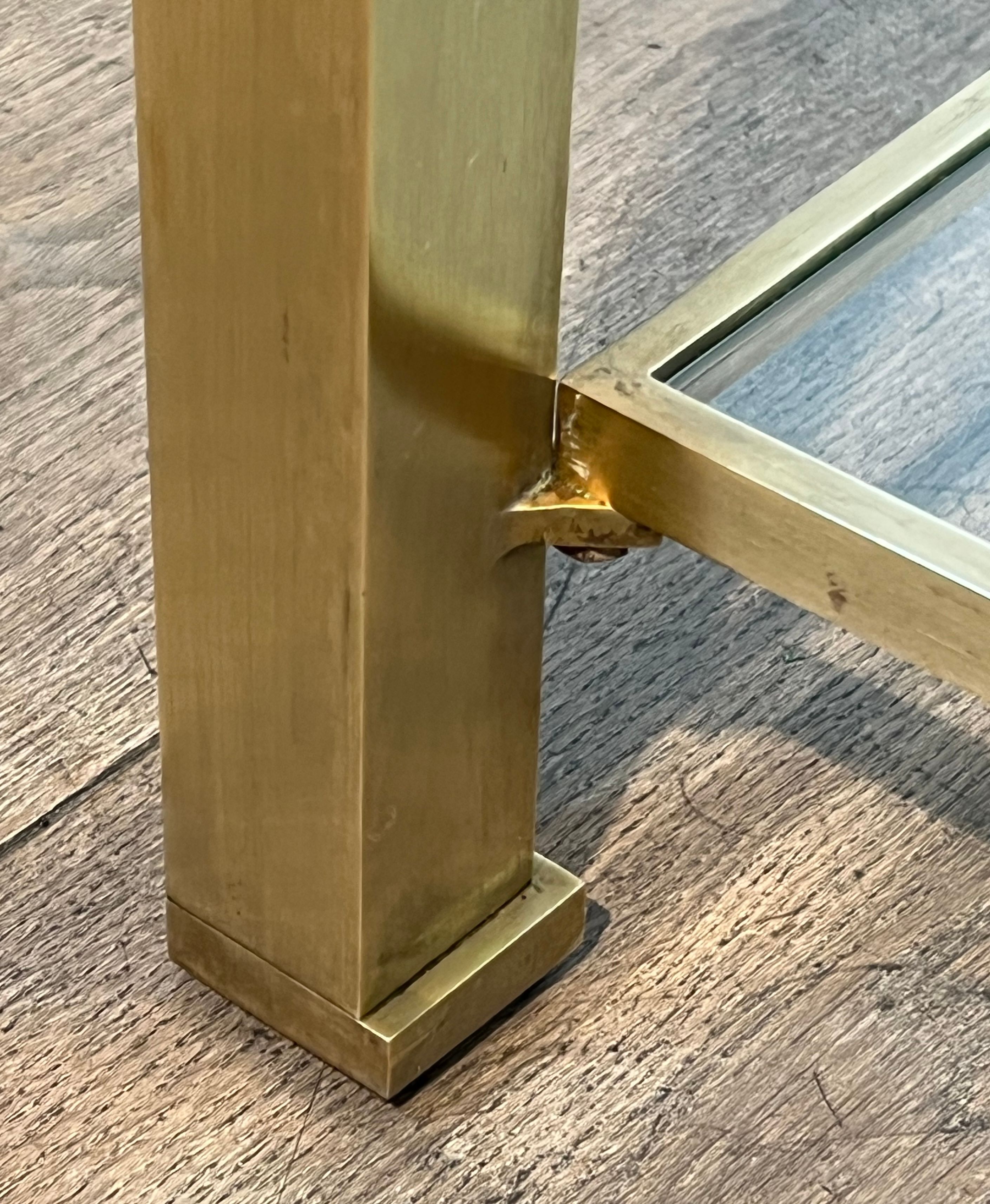 Modernist coffee table in brass and glass tops by Guy Lefèvre for Maison Jansen.