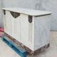Central island shop counter in marble and oak, Art Deco period.