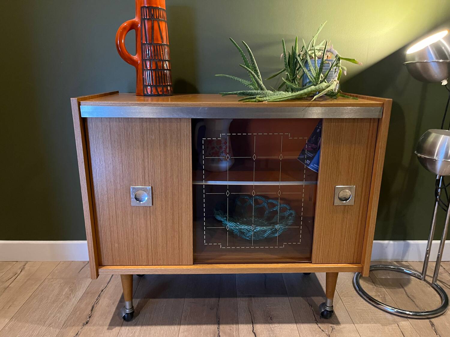 Vintage 1960s bar cabinet, Scandinavian style, on wheels.