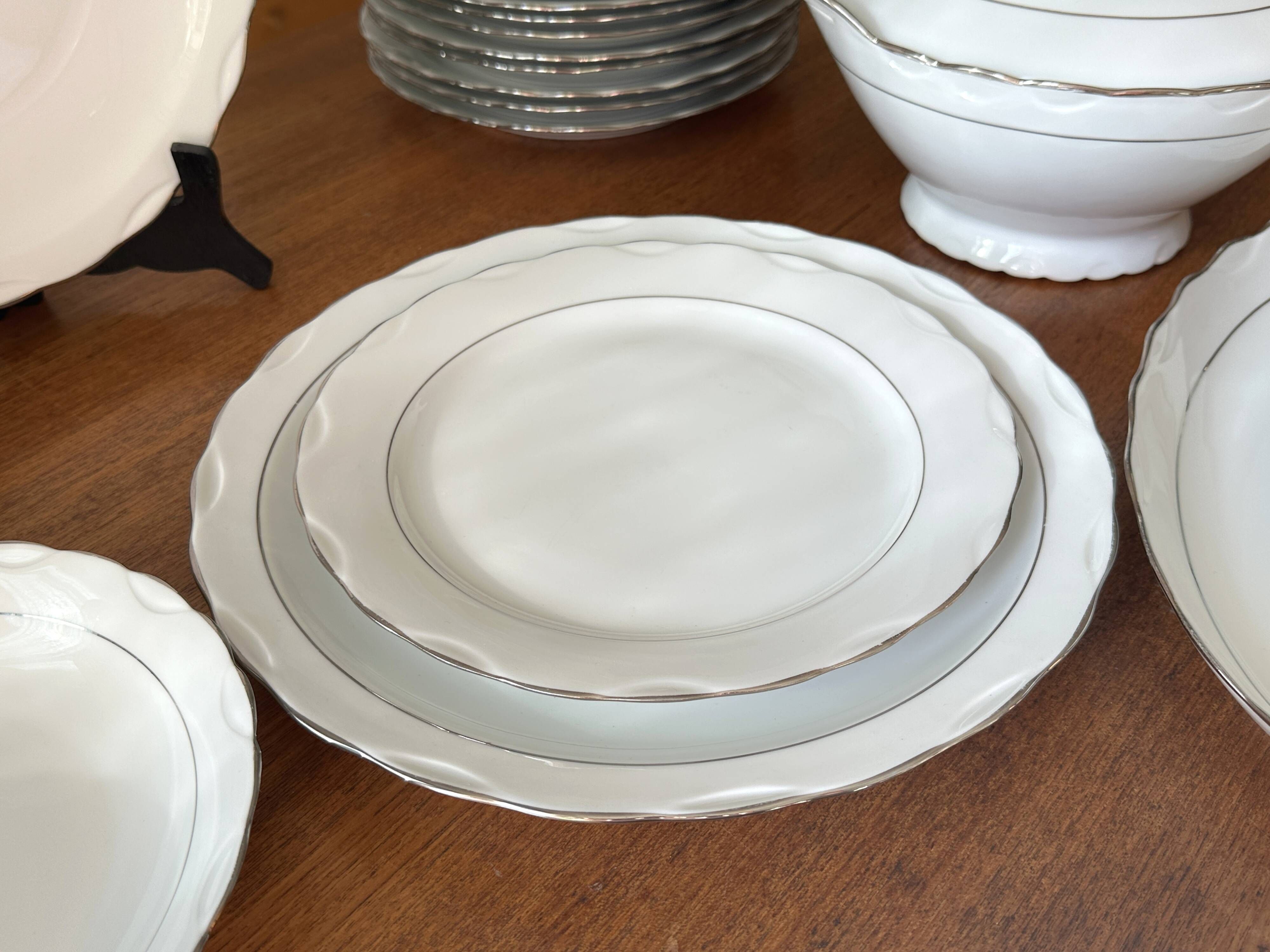 White and silver table service, Limoges porcelain, 56 pieces - in good condition.