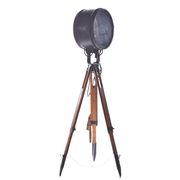 Old industrial spot on wooden tripod