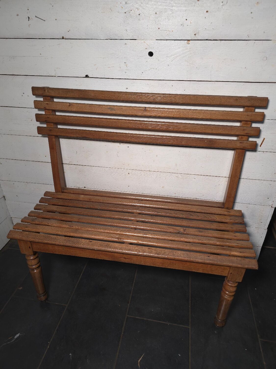 Solid oak workbench with slats signed by Edmond Magrez.