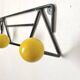 Vintage coat rack with ball hooks in Feraud style.