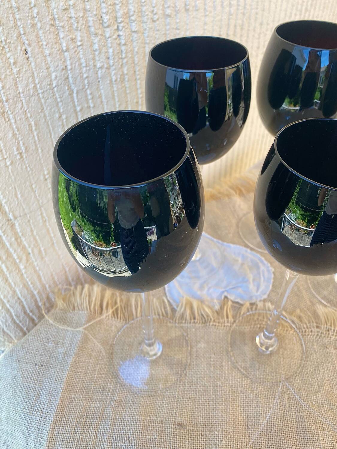 Footed glasses in blown purple bubble glass, Murano style.