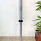 Round tripod table in smoked glass Roche Bobois 70