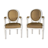 Paire de fauteuils cabriolets de style Louis XVI