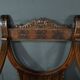 Pair of Dagobert walnut armchairs, medieval style – late 19th century