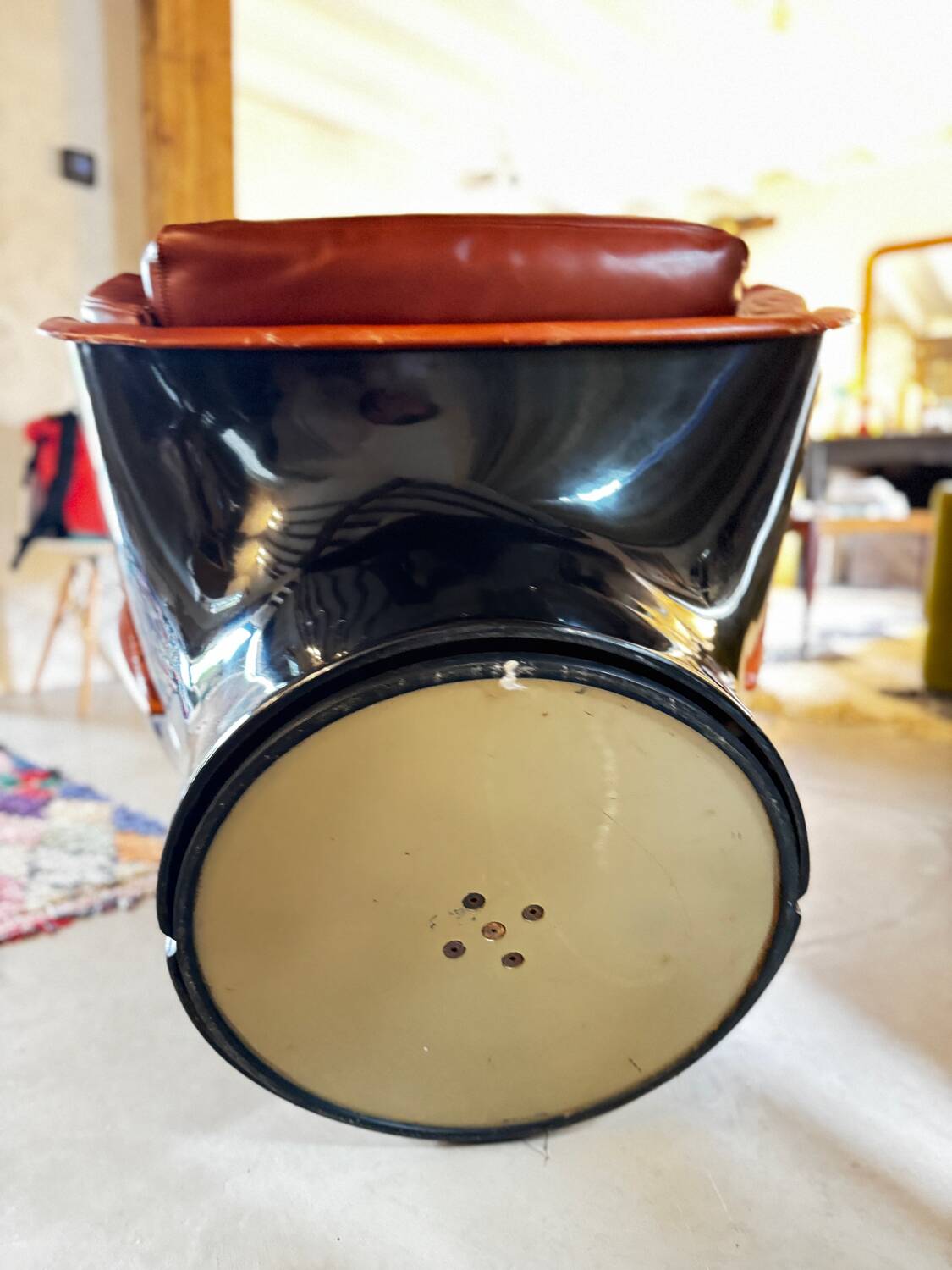 Elda armchair by Joe Colombo, black shell, brown leather