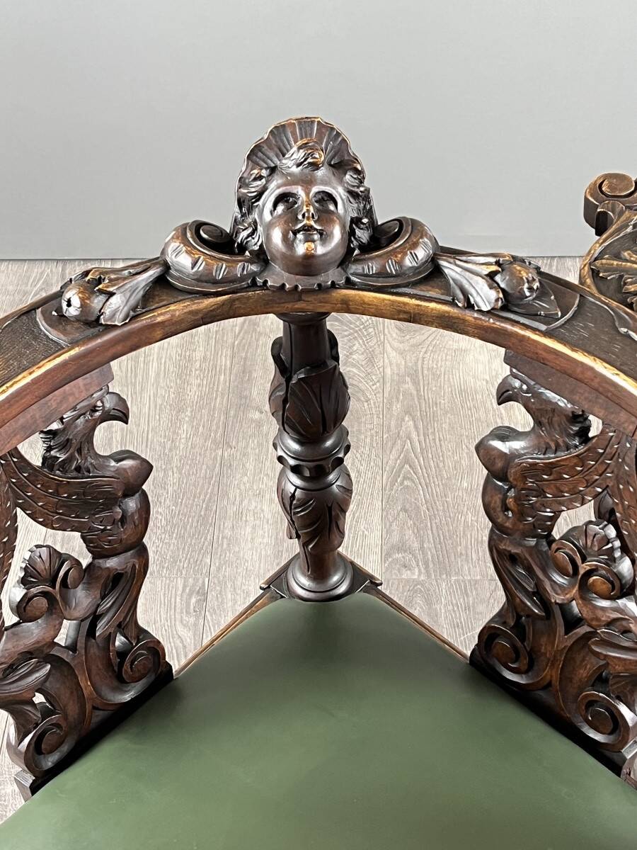 Pair of corner armchairs in carved wood, 19th century