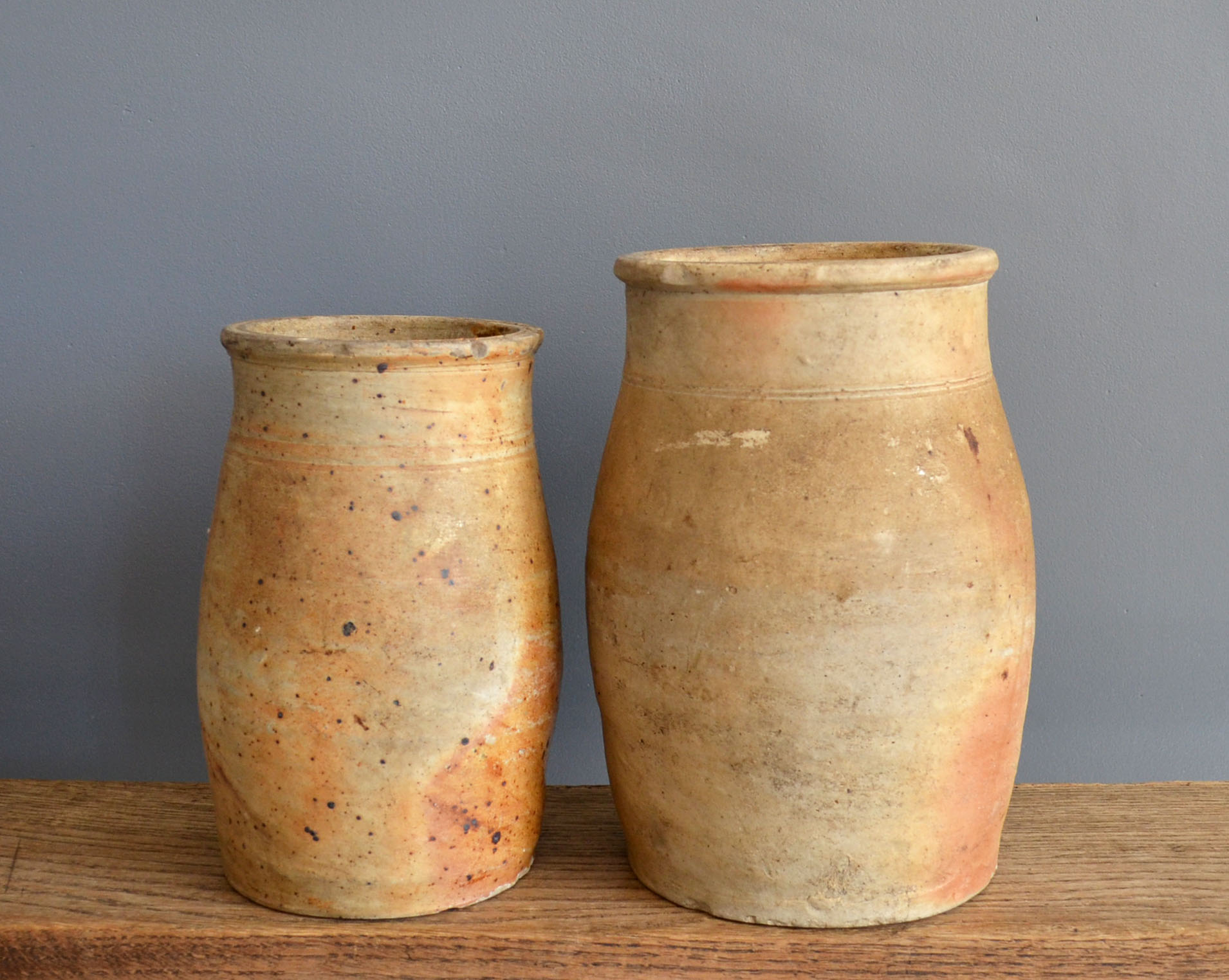 two jugs - old pots in matt sandstone
