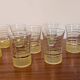 70s vintage glass with gold decoration and a speckled base.