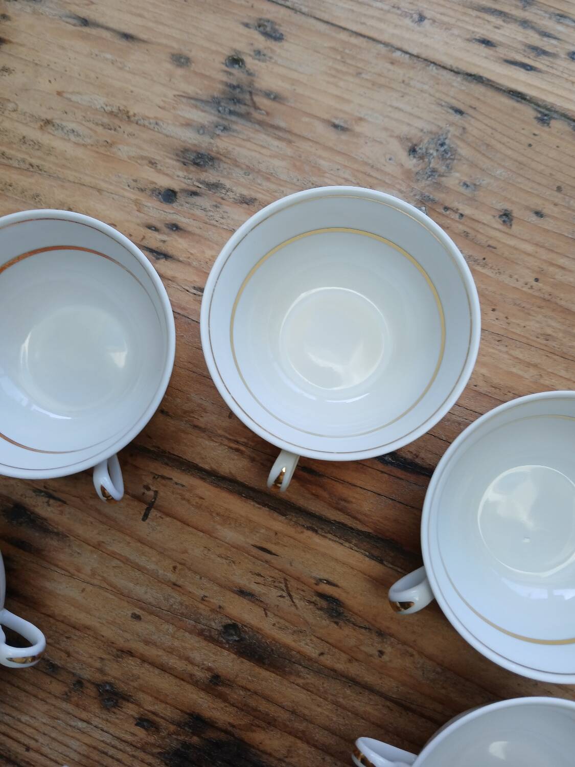 Set of 7 Limoges porcelain cups and saucers