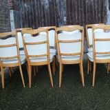 series of 8 vintage skai and wood chairs