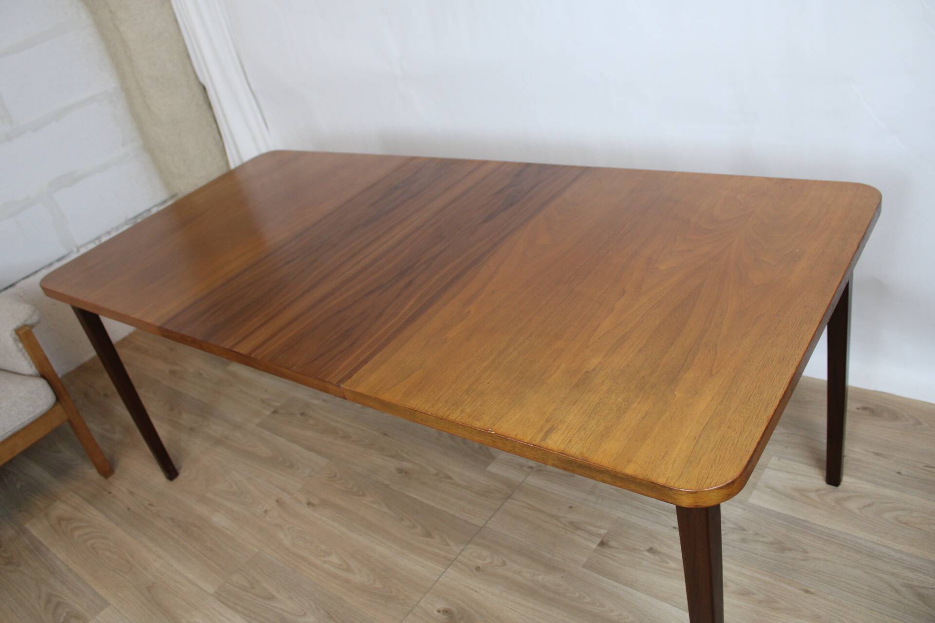 Vintage rectangular teak table with 130 cm dark legs and extension 1960 Sweden