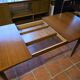 Table scandinave galbée extensible papillon en teck années 60