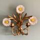 Wall lamp in gilded brass with a daisy design.
