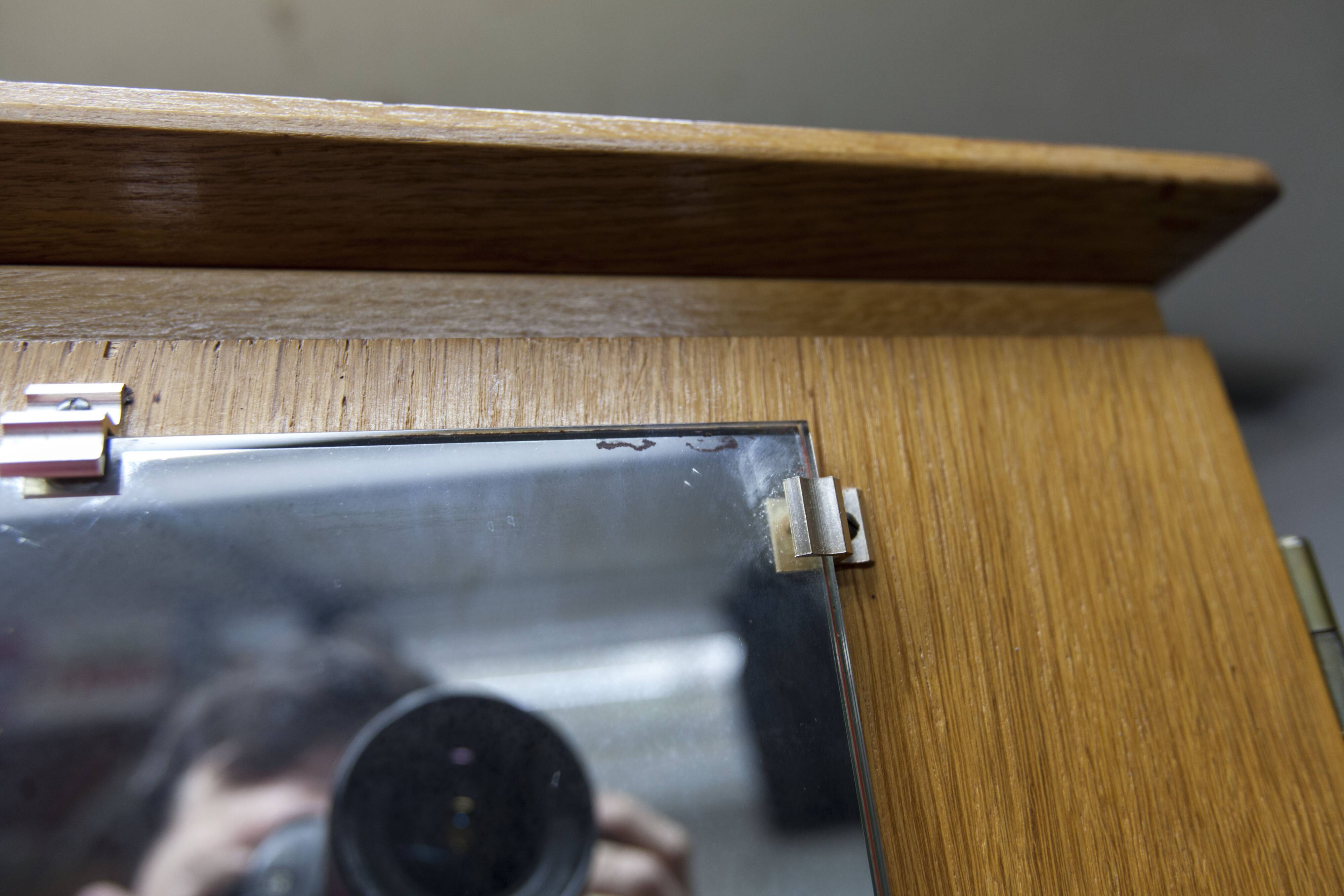 French wardrobe with tapered legs, 3 doors, 1 mirror (27*130), and 1 drawer.