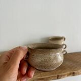 6 stoneware cups and saucers