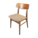 Dining room chair in teak and light fabric of danish design from the 1960s.