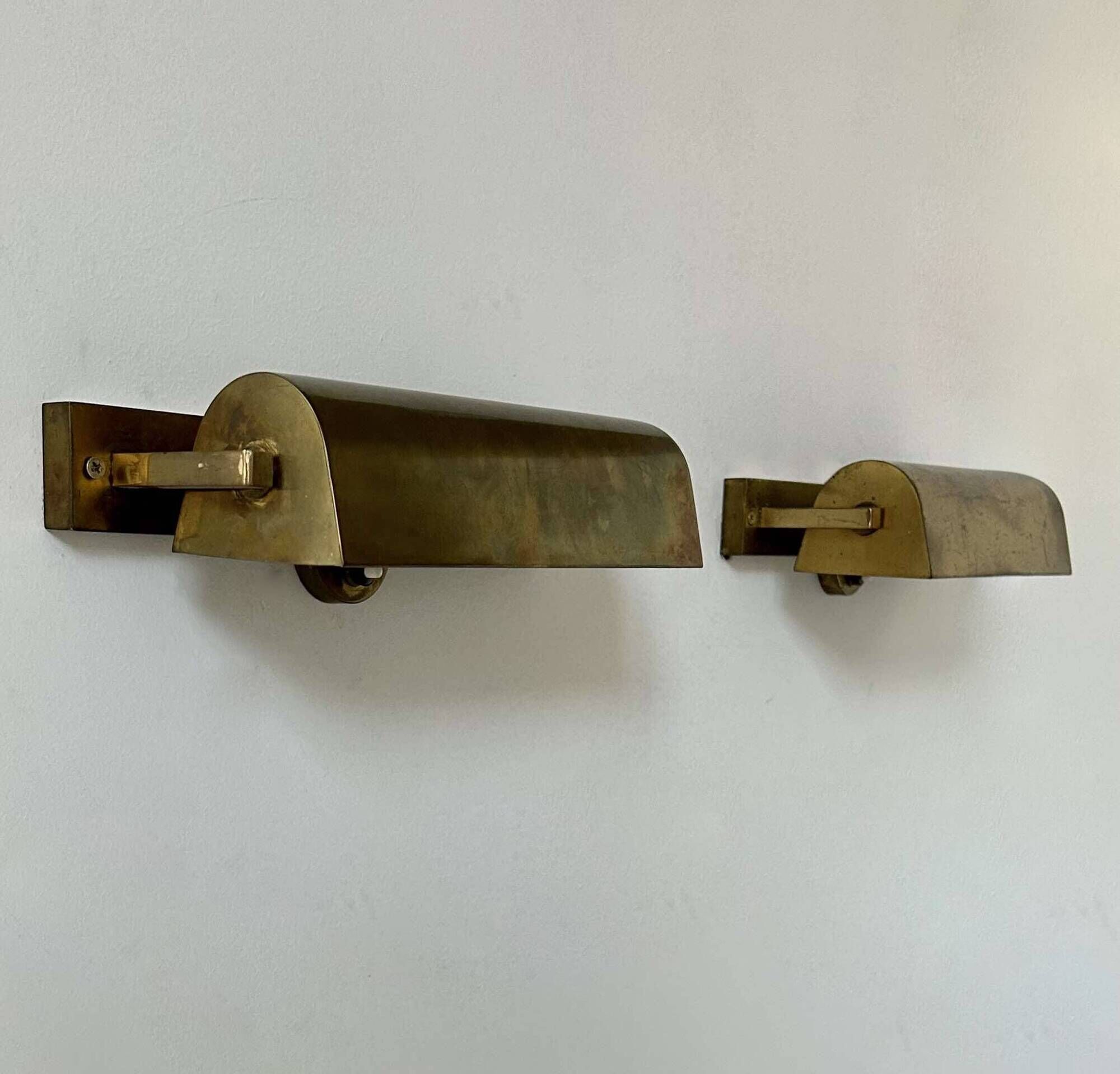Pair of vintage modernist wall lights, adjustable in brass, France 1940