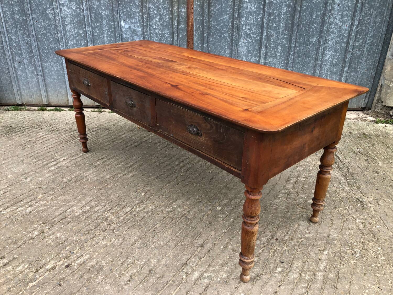 Antique Louis Philippe table in solid cherry and oak with 3 drawers
