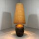 Large amphora floor lamp in pottery with a rattan shade from the 1960s.