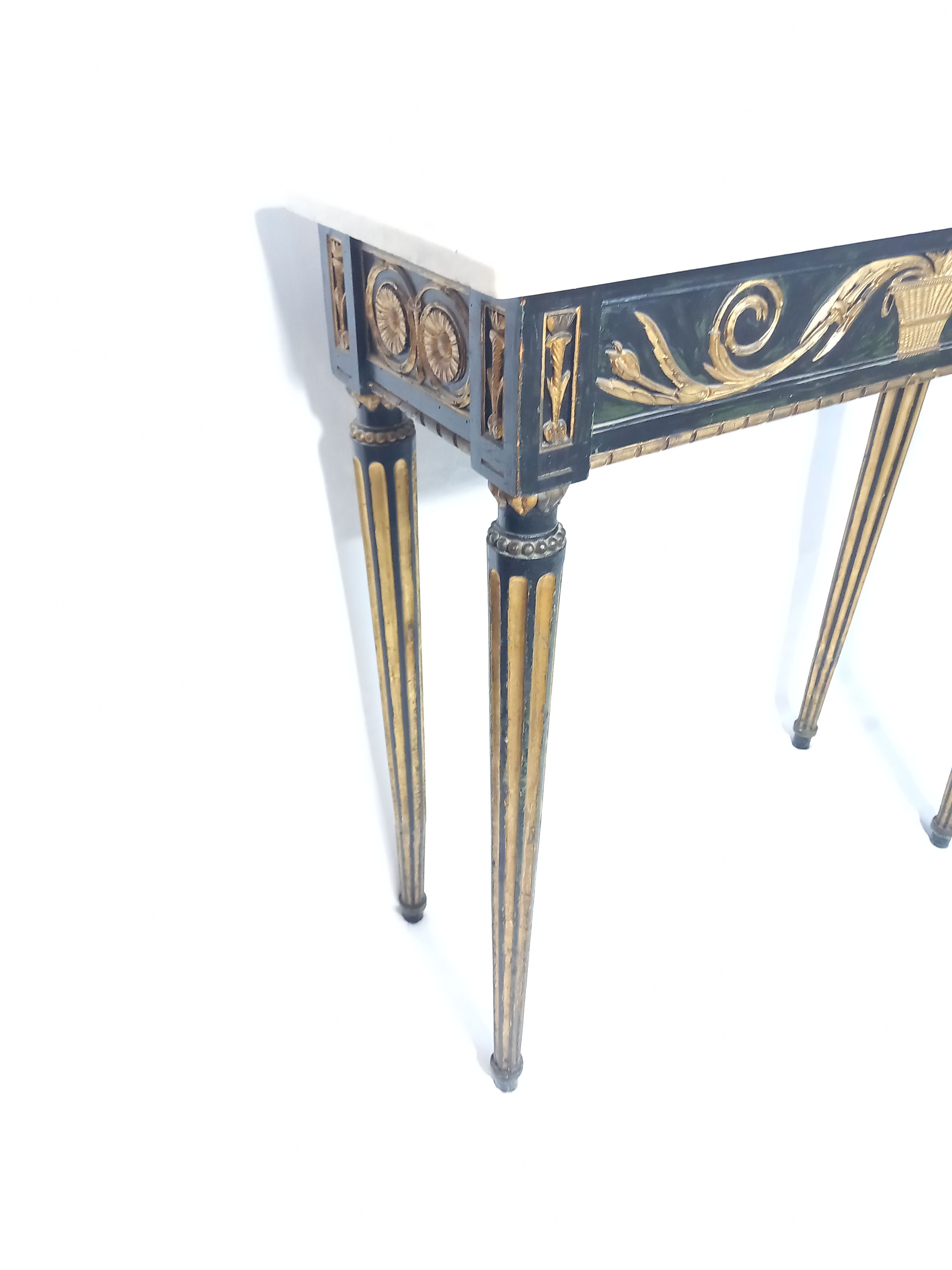 19th century Louis XVI style console table in black and gold with white marble shelf