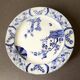 Assiette sur piédouche en faïence bleue et blanche Creil & Montereau, service "Japon", XIXème siècle